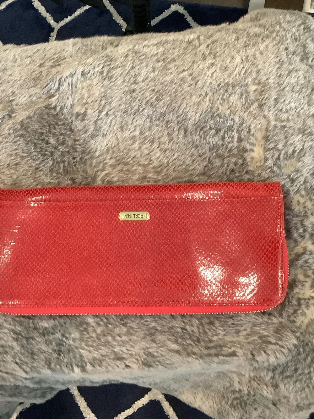 Perlina Red Zip-Around clutch bag with Gold trim